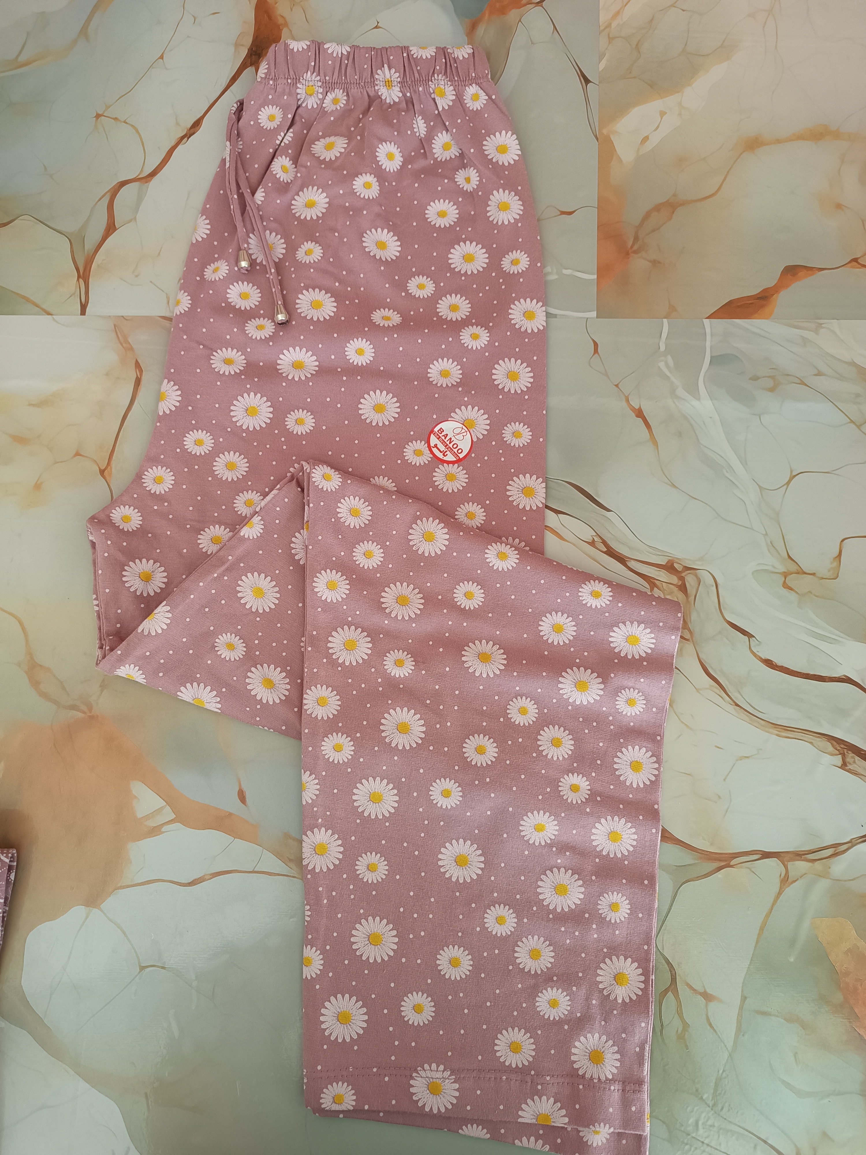 شلوار نخ پنبه صورتی طرح بابونه